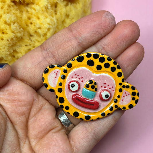 Ceramic brooch "Floppy-eared leopard"